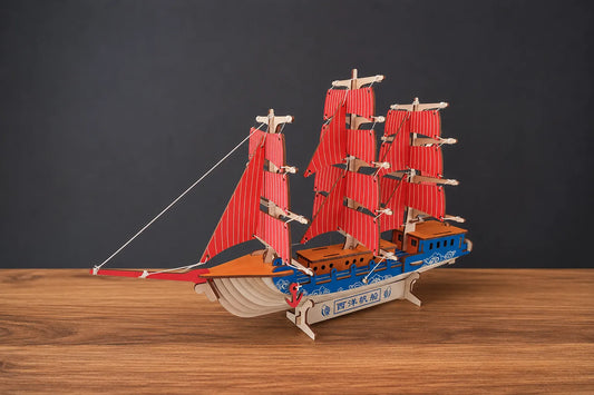 Maquette en bois - Bateau à voiles rouge